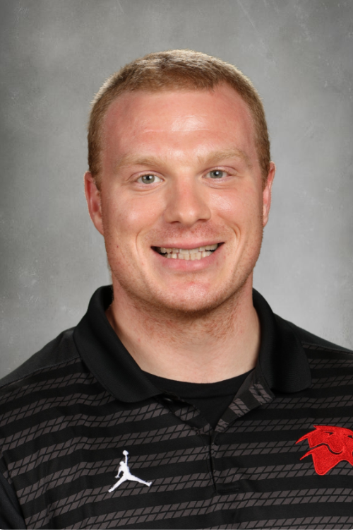 image of man in black polo